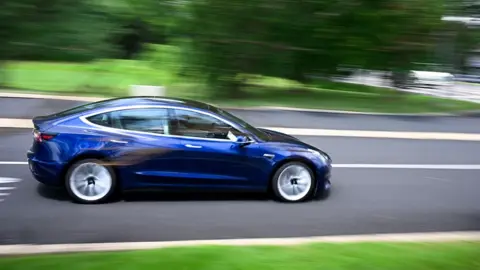 Tesla investigated over self-driving cars on wrong side of road