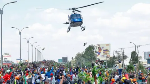 At least three dead after Kenya police open fire to disperse mourners of ex-PM Raila Odinga