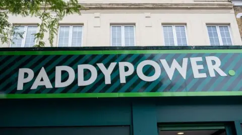 Betting firm Paddy Power to close 57 shops in UK and Ireland