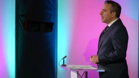Six by-election candidates take part in rowdy debate