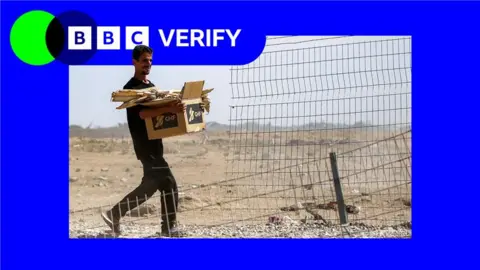 Aid group suspends Gaza operations after ceasefire